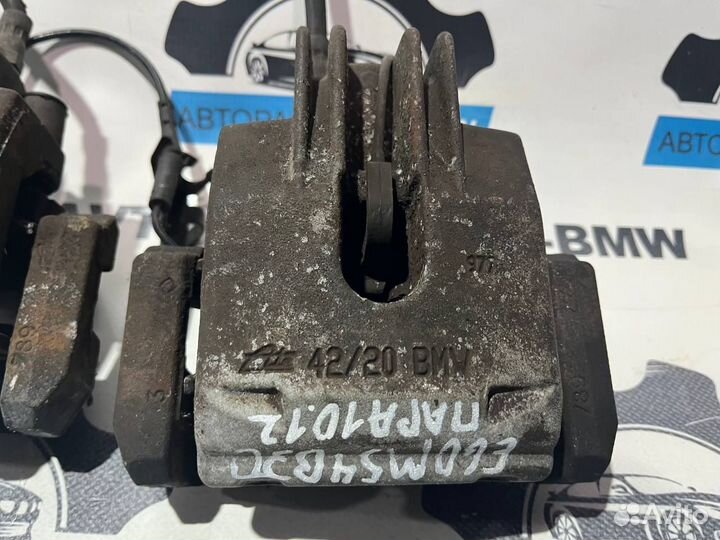 Суппорт тормозной задний левый правый BMW 5-серия