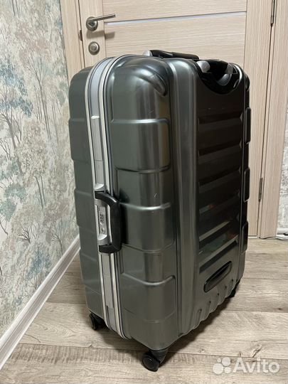 Чемодан Samsonite спинер четырёхколёсный
