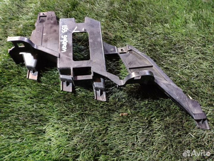 Кронштейн крепления фары левый Bmw E53