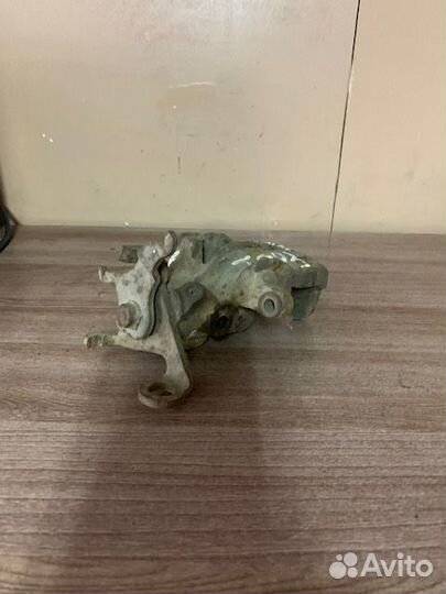 Суппорт тормозной задний левый Focus I