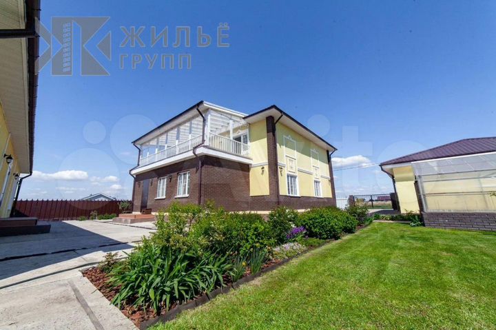 Коттедж 260 м² на участке 12 сот.