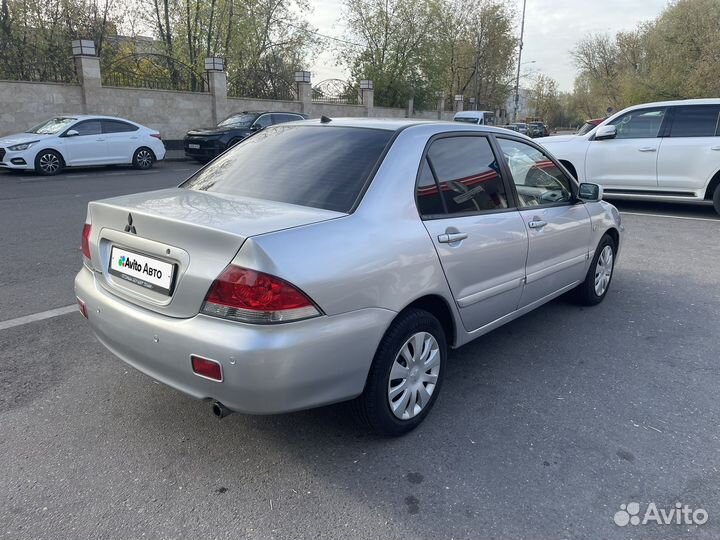 Mitsubishi Lancer 1.6 МТ, 2006, 205 000 км