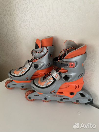 Роликовые коньки