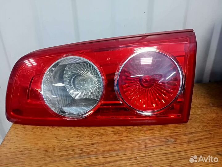 Продам задние фонари на мазду демио