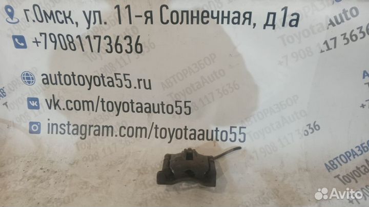 Суппорт передний левый Тойота Королла Е120