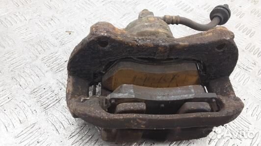 Суппорт тормозной передний правый opel astra J (5L