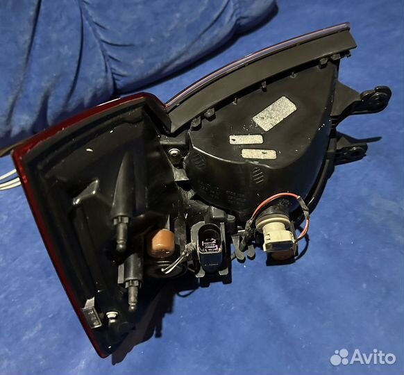 Фонарь задний левый на Шкоду Рапид