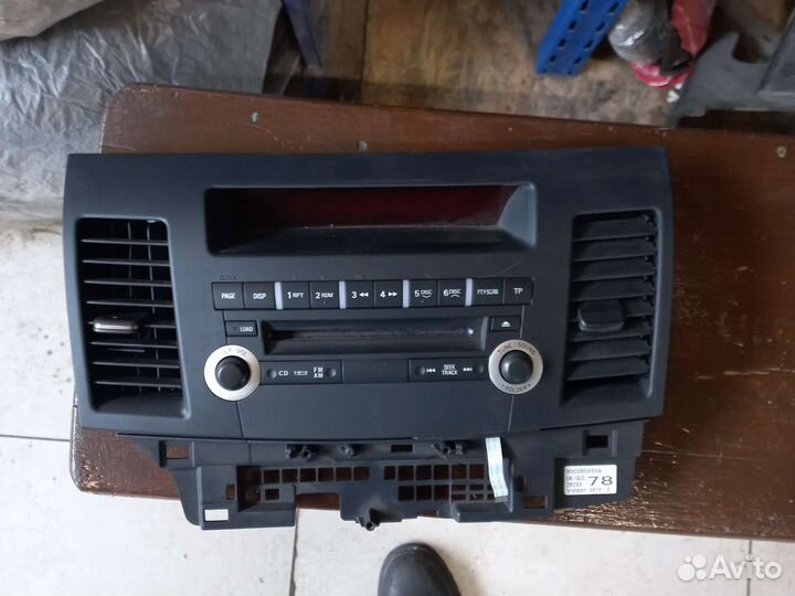 Панель магнитолы Mitsubishi Lancer X