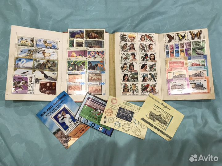 Коллекция марок в альбоме