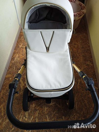 Коляска адамакс