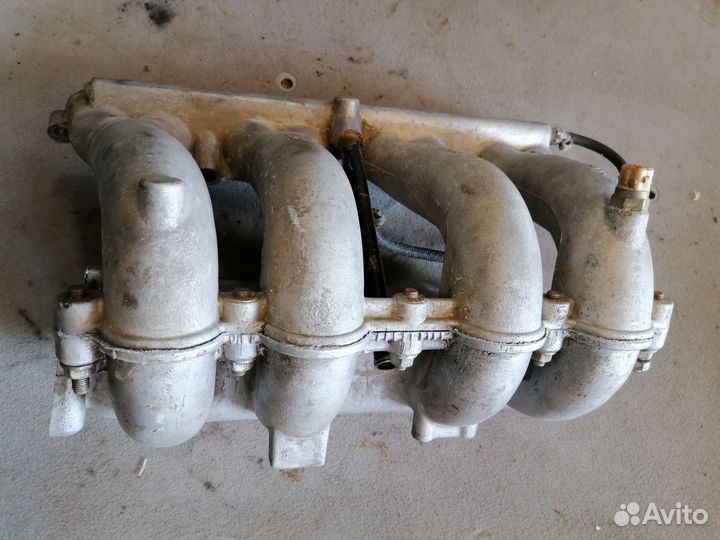 Коллектор впускной газ Волга 31105 змз406 2003-09