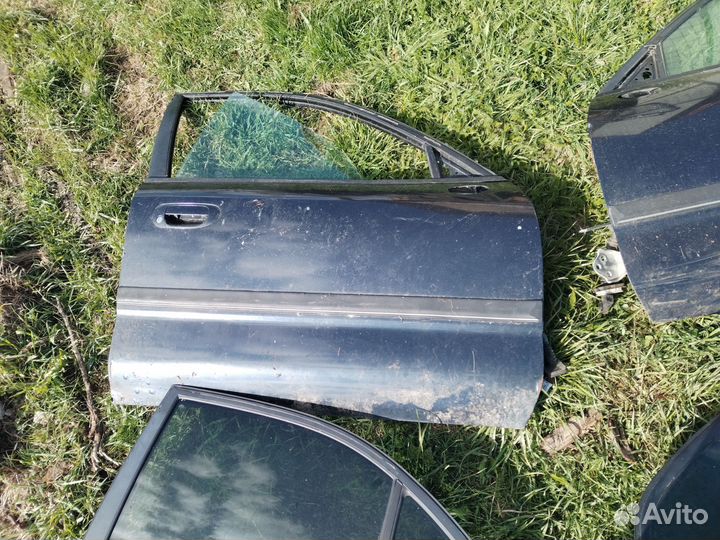 Двери мицубиси каризма