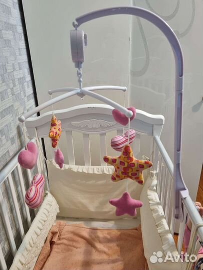 Музыкальный мобиль на кроватку