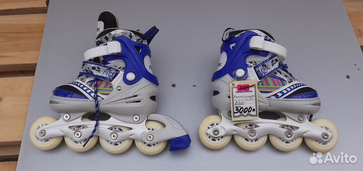 Роликовые коньки