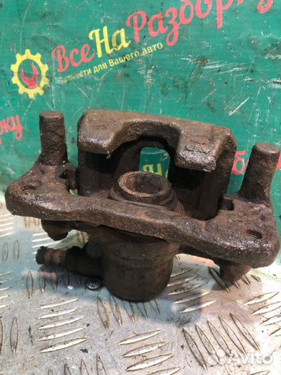 Суппорт задний левый Mitsubishi Lancer 9 седан