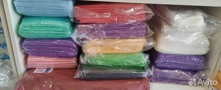 Одноразовые простыни в рулоне