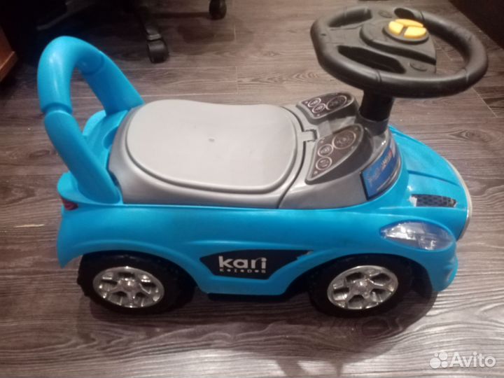 Машинка каталка толокар