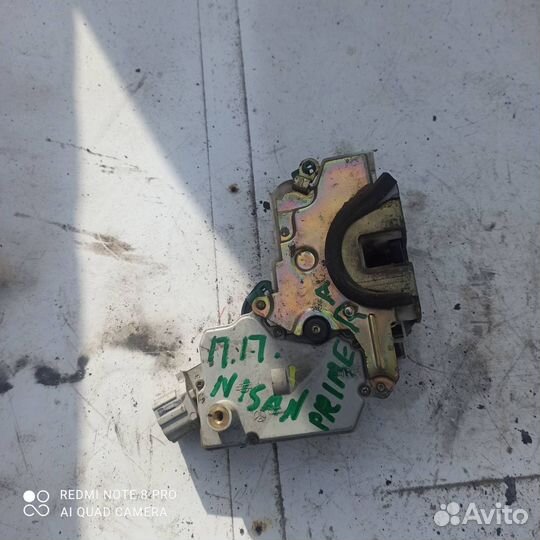 Замок передней правой двири Nissan Primera P11