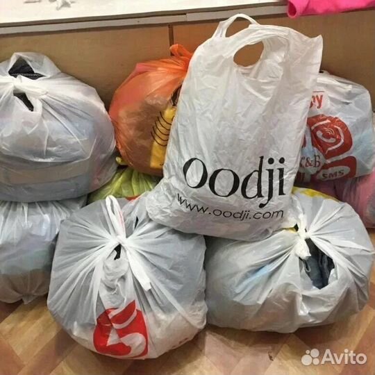 Вещи пакетами и сумки