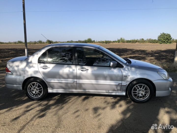 Mitsubishi Lancer 1.6 МТ, 2006, 255 000 км