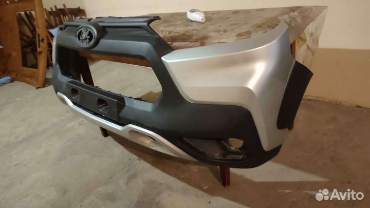 Передний бампер на ниву тревал