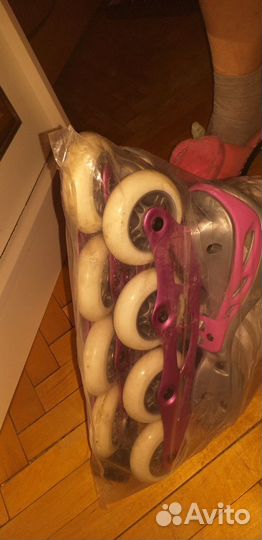 Роликовые коньки