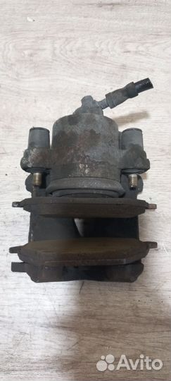 Суппорт тормозной передний Skoda Octavia A5