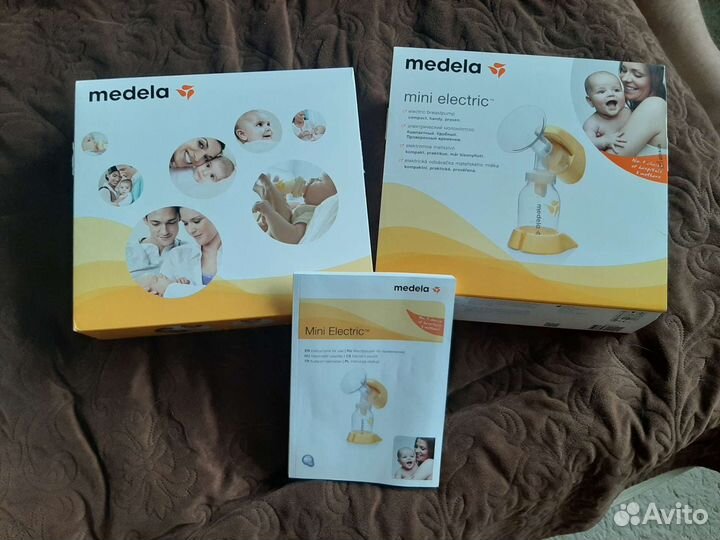 Молокоотсос medela электрический