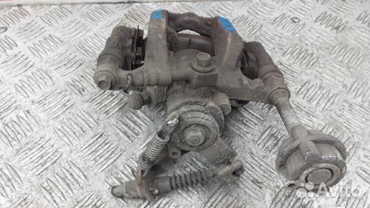 Суппорт тормозной задний правый opel astra J (GEA2