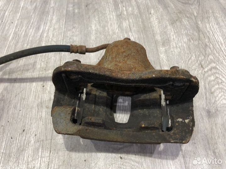 Суппорт тормозной передний левый Hyundai Solaris