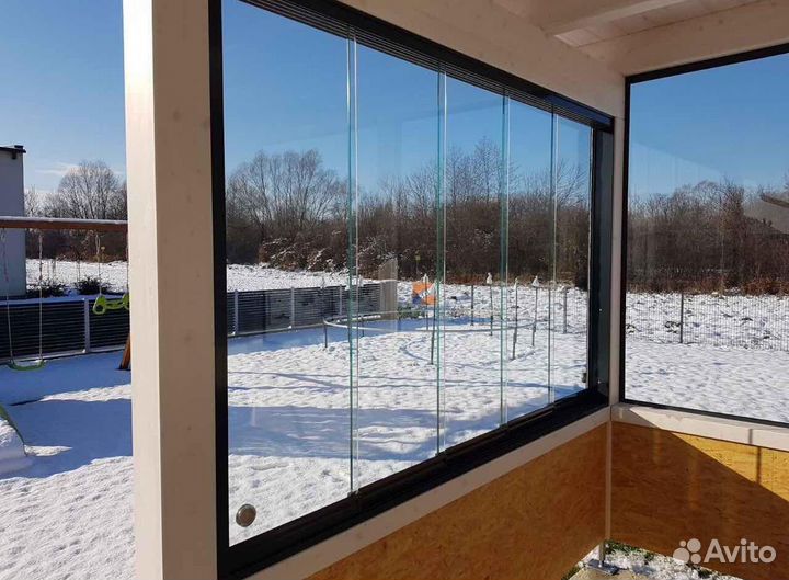 Безрамное остекление домов