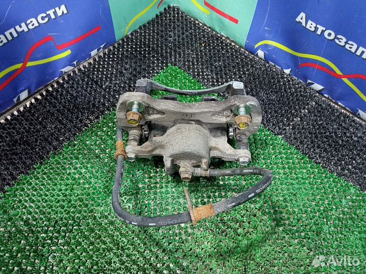 Суппорт тормозной передний правый Mitsubishi Pajer