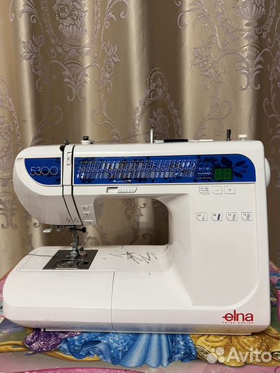 Швейная машина elna
