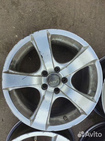 Диски Subaru R16