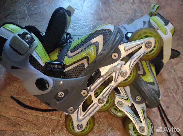 Роликовые коньки