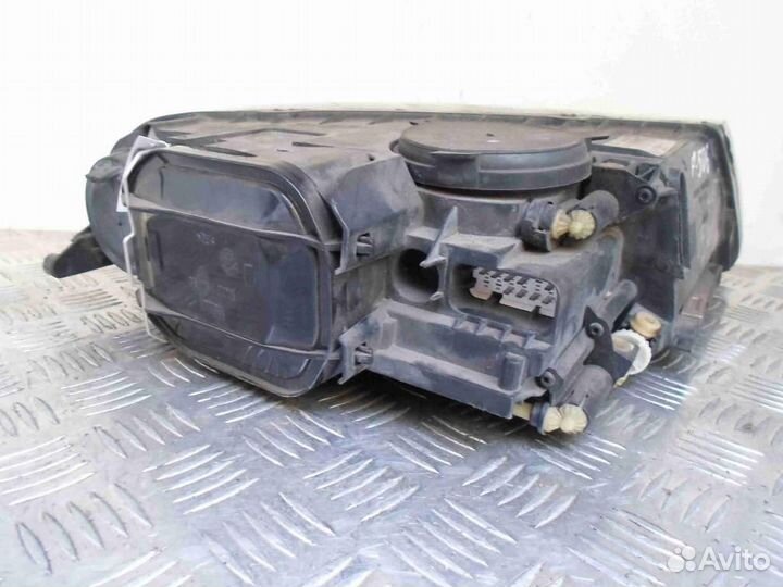 Фара левая Volkswagen Touareg