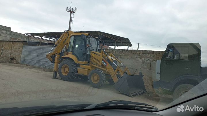 Услуги экскаватора погрузчика