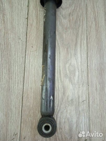 Амортизатор задний левый Opel Astra J универсал