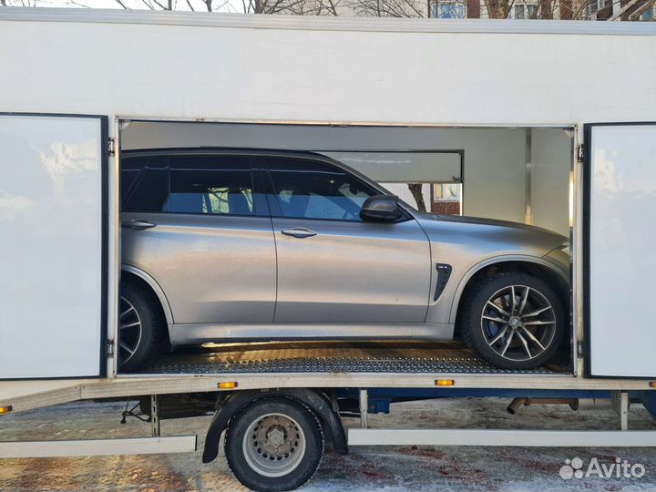 Крытый эвакуатор автовоз