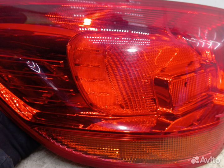 Фонарь задний левый Opel Astra J