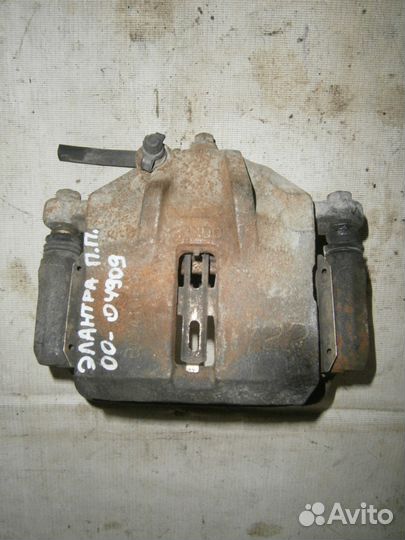 Суппорт передний правый 2.0 л Hyundai Elantra XD