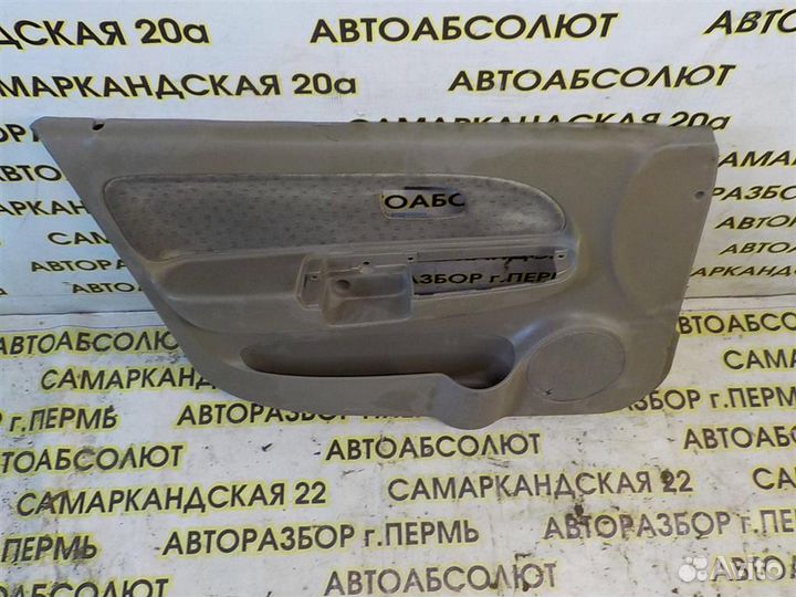 Обшивка двери передней левой KIA RIO I (DC) 2000