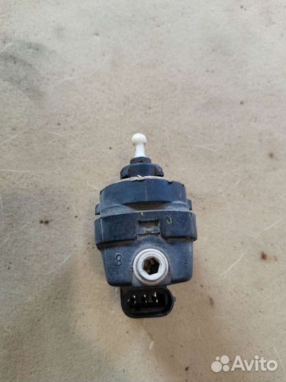 Электрокорректор фары Рено Меган 2