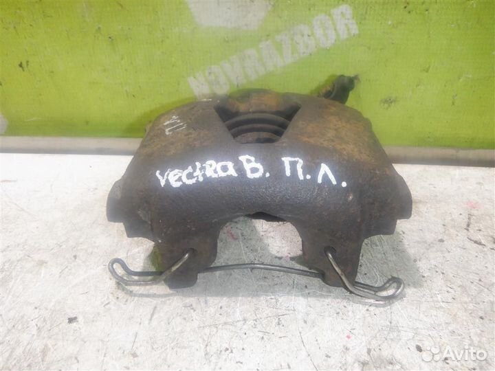 Суппорт передний левый Опель Вектра Б
