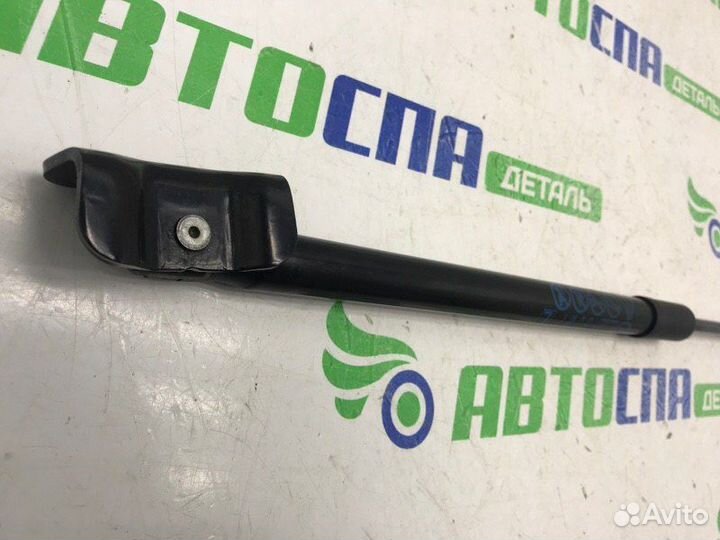 Амортизатор крышки багажника задний левый Mazda