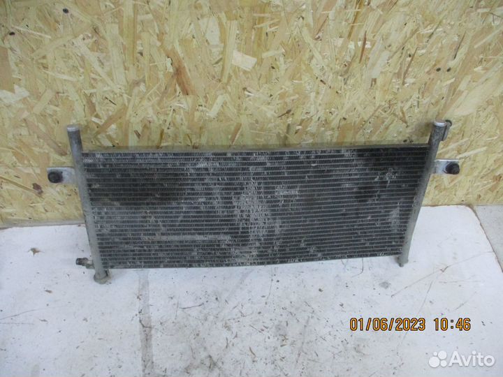Радиатор кондиционера Ниссан NP300 (2010)