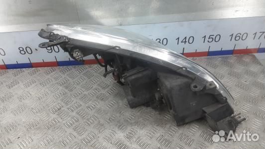 Фара левая toyota corolla verso 2 (1BR03MR01)