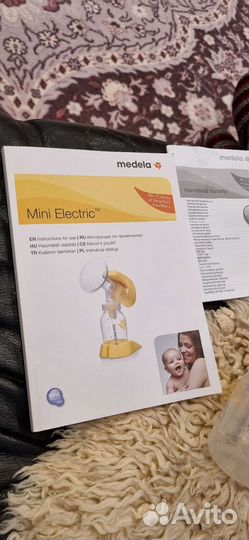 Молокоотсос medela электрический