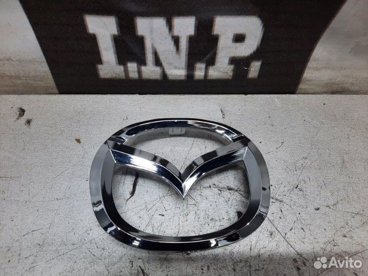 Эмблема передняя Mazda 3 Bk 2003-2006