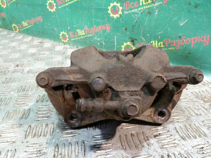 Суппорт передний левый Chevrolet Aveo T300 седан